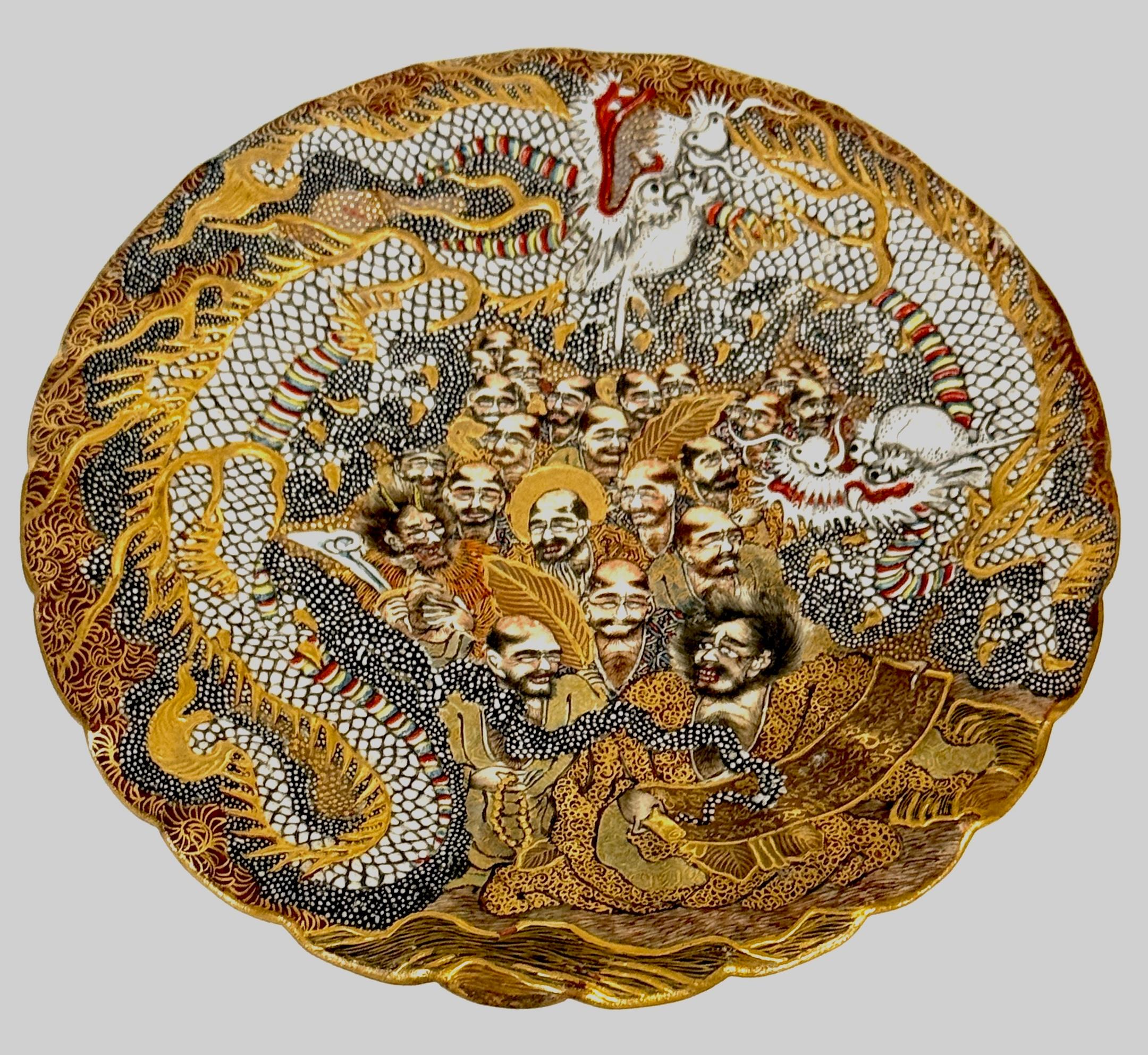 Meiji Tasse et soucoupe Dragons et Immortels de Satsuma par Kitagawa-zō, signée Dai Nippon en vente