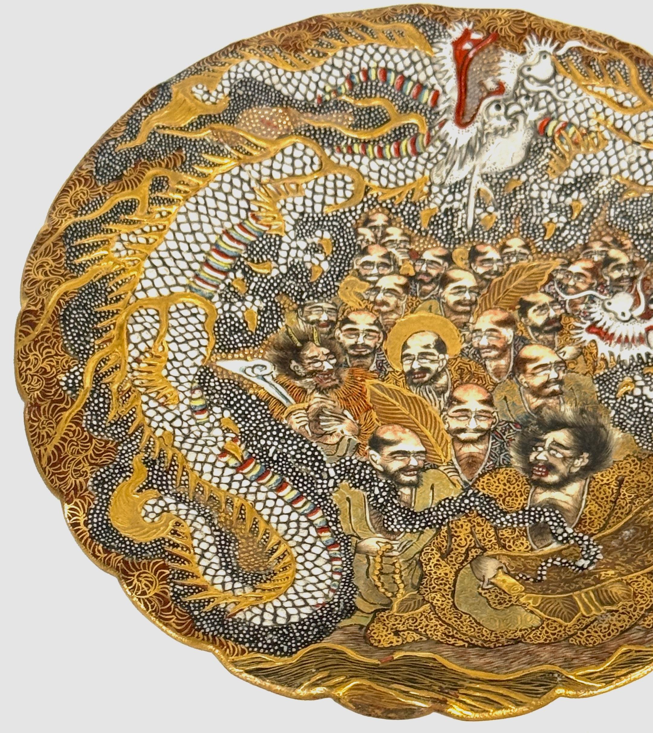 Émaillé Tasse et soucoupe Dragons et Immortels de Satsuma par Kitagawa-zō, signée Dai Nippon en vente