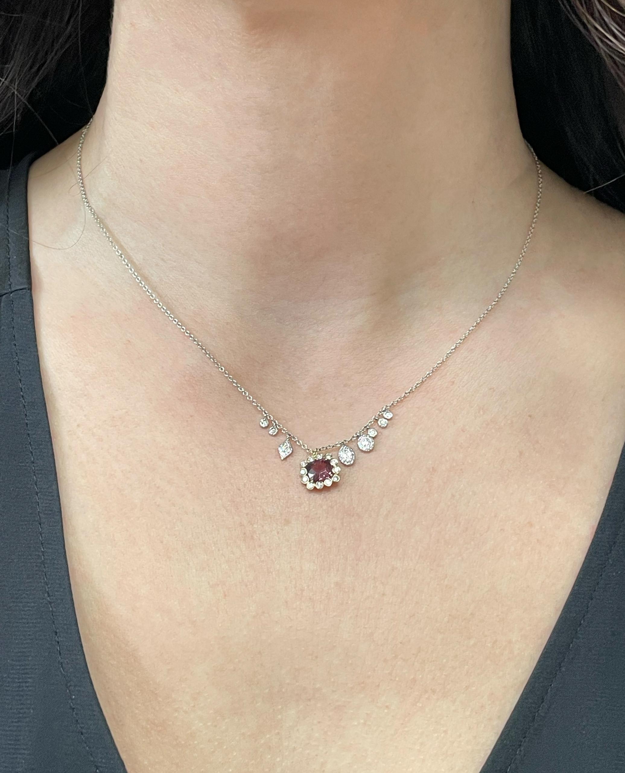 Meira T. 14K two tone gold pendant necklace with diamonds weighing 0.76 carat total.   In the center, one cushion shaped pink tourmaline.  

- Necklace can be worn 16, 17, or 18 inches. 