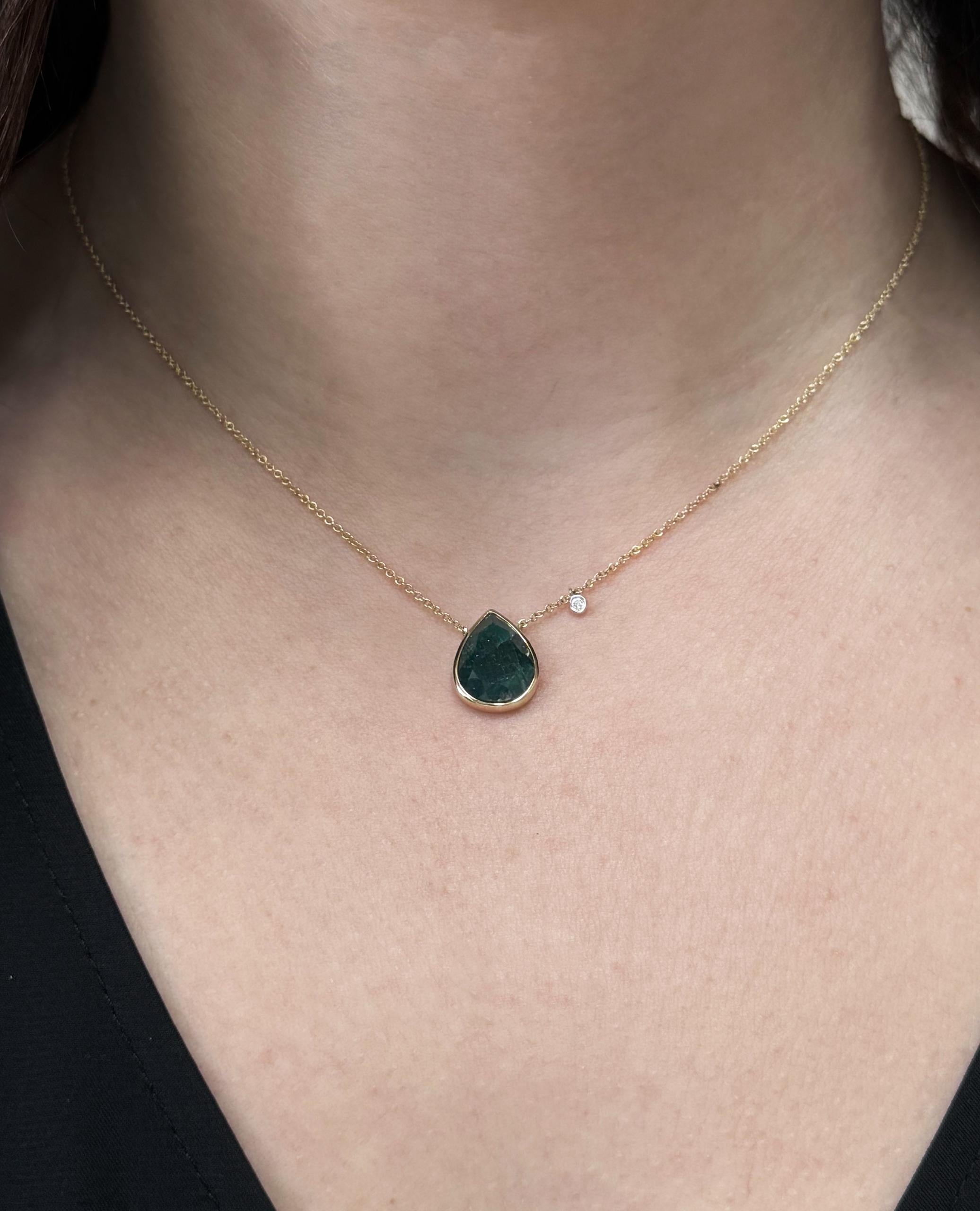 Meira T. 14K yellow gold pendant necklace with one diamond weighing 0.02 carat and one pear-shaped emerald weighing 5.03 carats.  

- Necklace can be worn 16, 17 or 18 inches. 