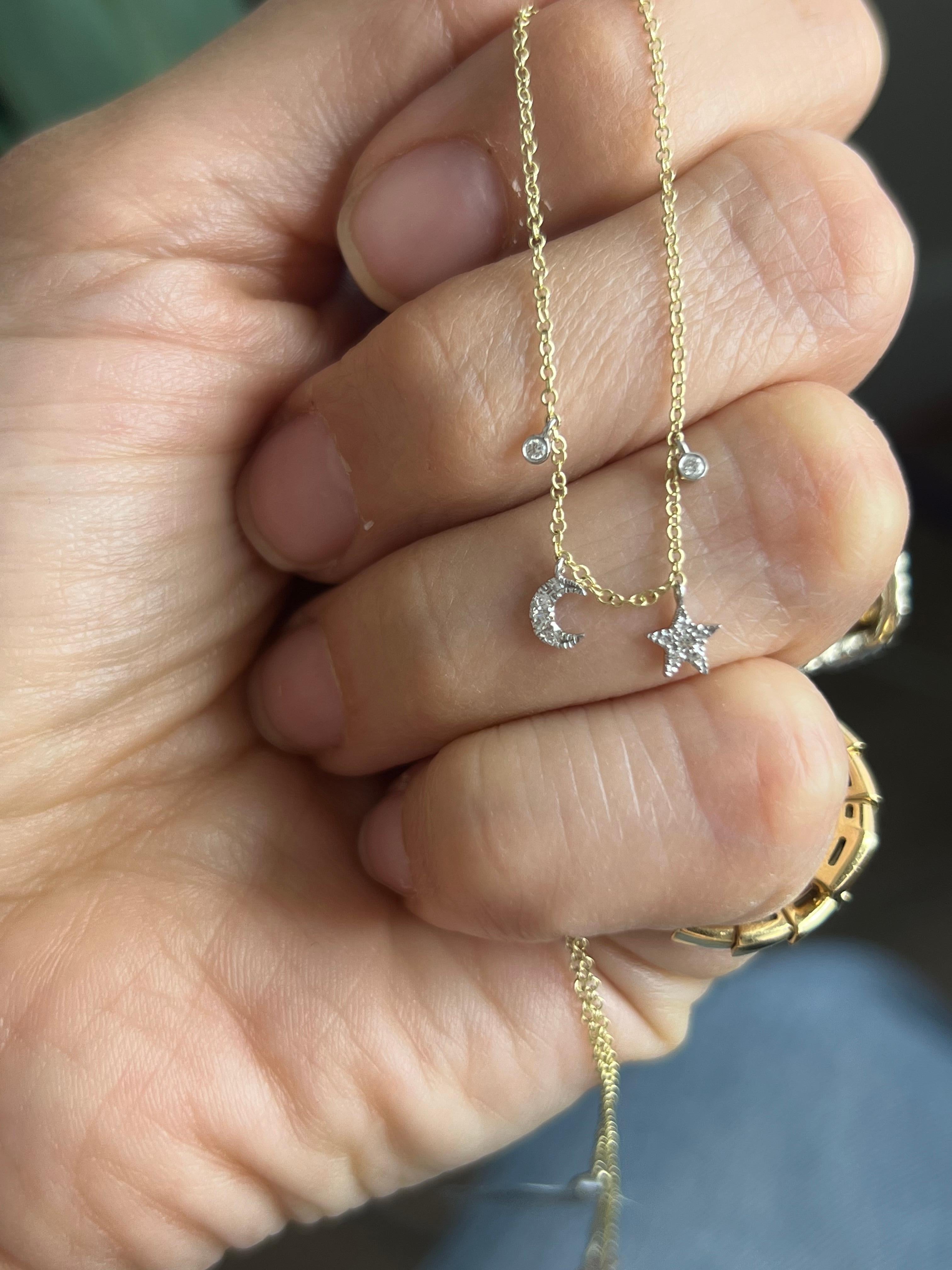 14K yellow gold and diamond moon and star necklace

Meira T is a renowned jewelry designer who has been crafting exquisite pieces for over two decades. Her designs are inspired by her global travels, and her pieces are made with the finest quality
