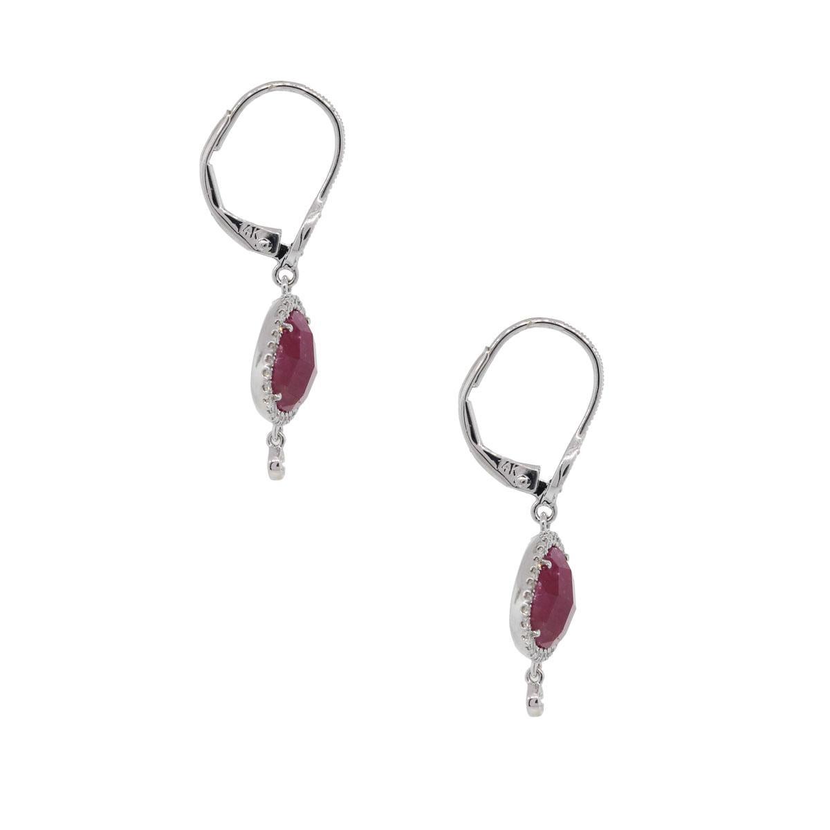 Designer: Meira T
Style: Ruby and Diamond drop earrings
Material: 14k White Gold
Diamond Details: Approximately 0.27ctw of round brilliant diamonds. Diamonds are G/H in color and SI in clarity
Gemstone Details: Approximately 3.94ctw of checkerboard