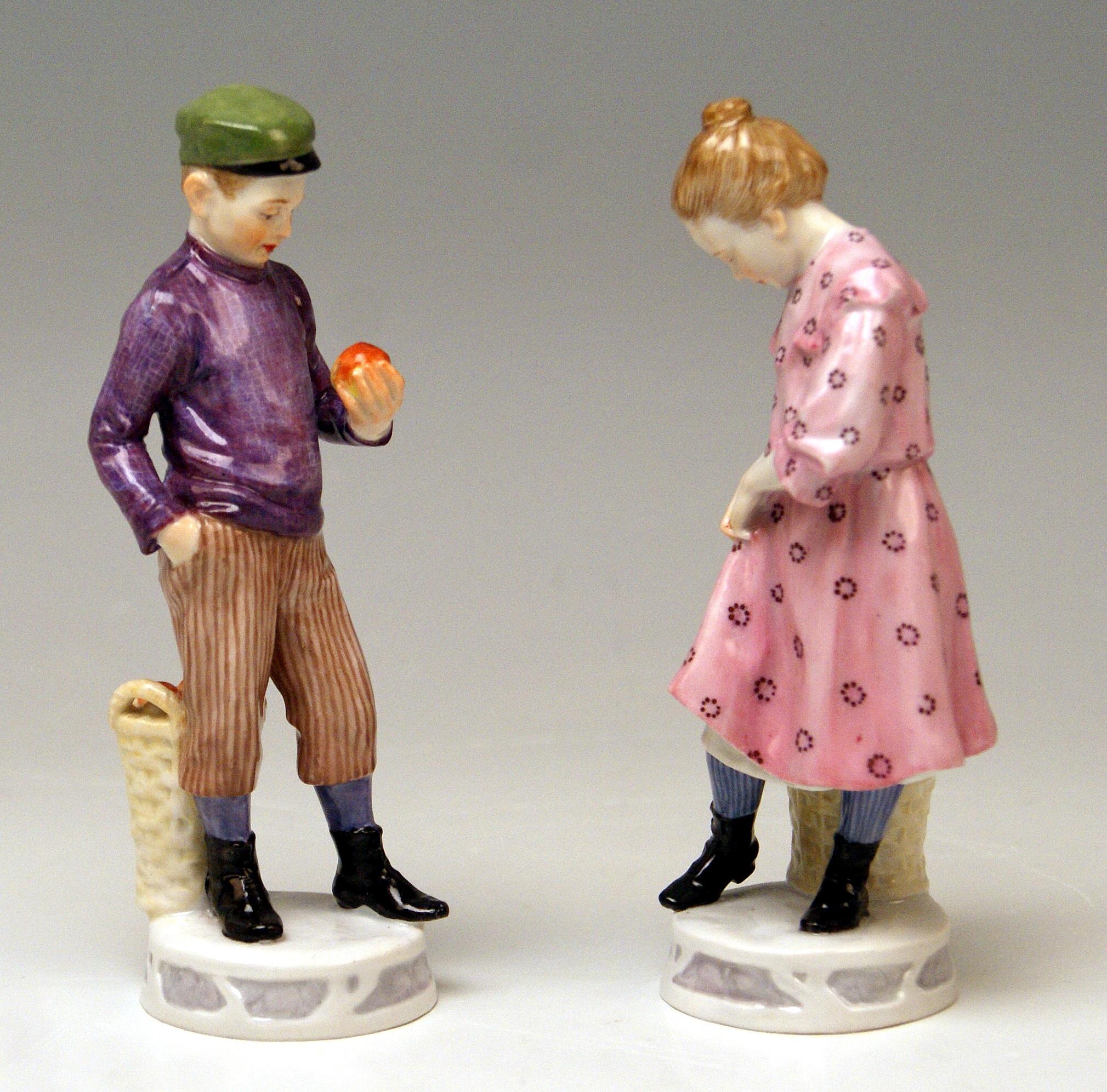 MEISSEN GORGEOUS PAIR OF ART NOUVEAU FIGURINES:  Boy and Girl with Apples

Manufactory: Meissen 
Dating:      made circa 1910
Hallmarked:  Meissen Mark with Pommels on Hilts (shortly after Turn of the Century)
FIRST
