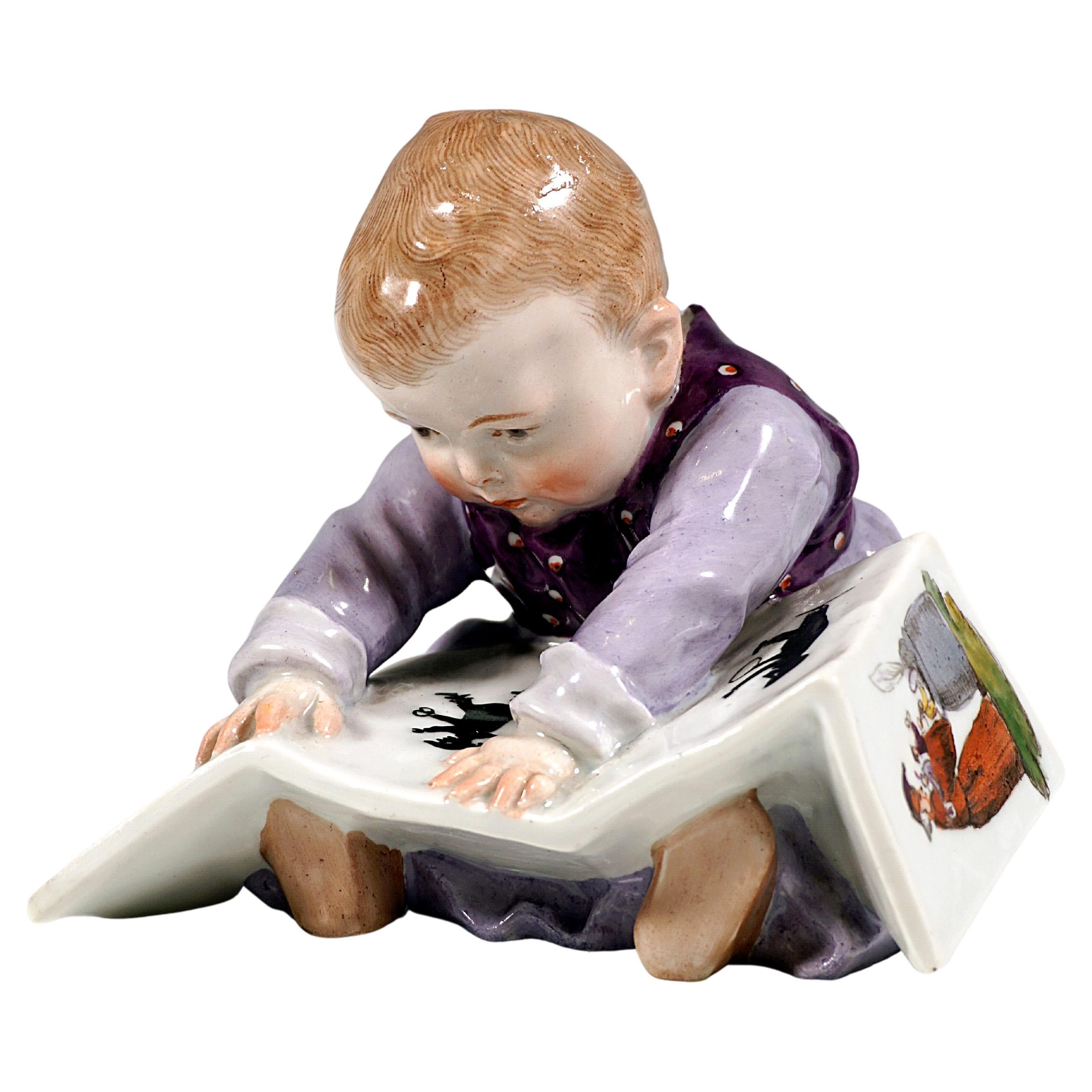 Meissen Art Nouveau Figurine, Baby Child with Picture Book, by Konrad Hentschel
