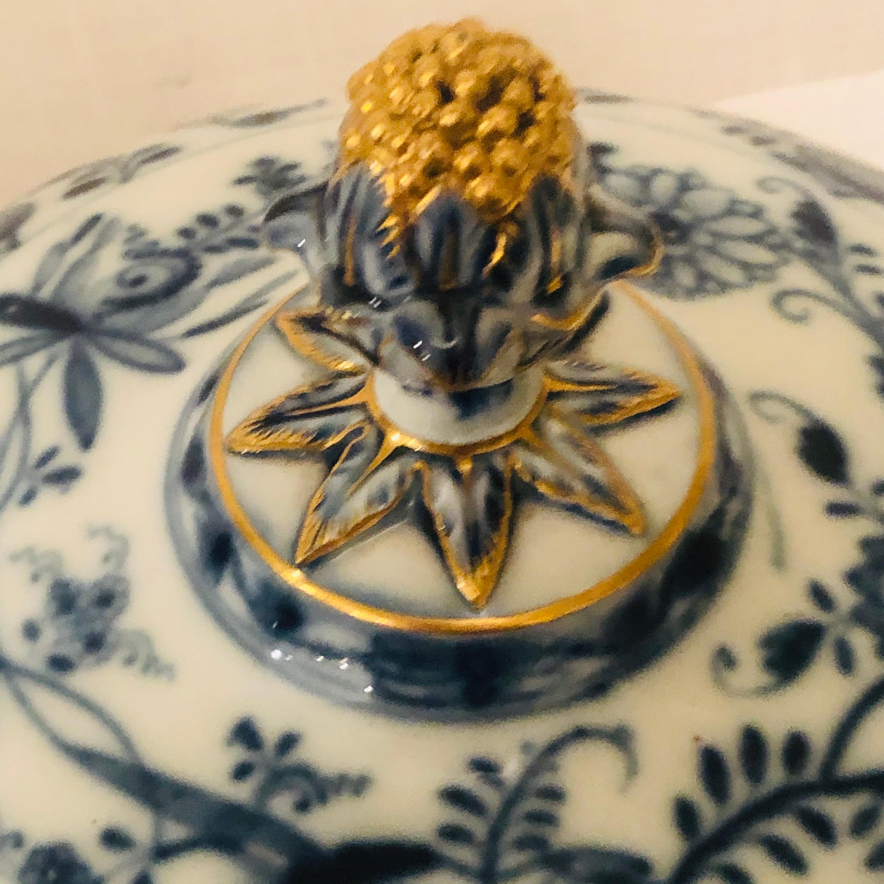 I am proud to present you with this fabulous Meissen blue onion serving piece. I do not think I have ever seen a Meissen serving piece like this. It is a covered serving bowl or pot with gold decorated accents. It is quite the presentation piece.