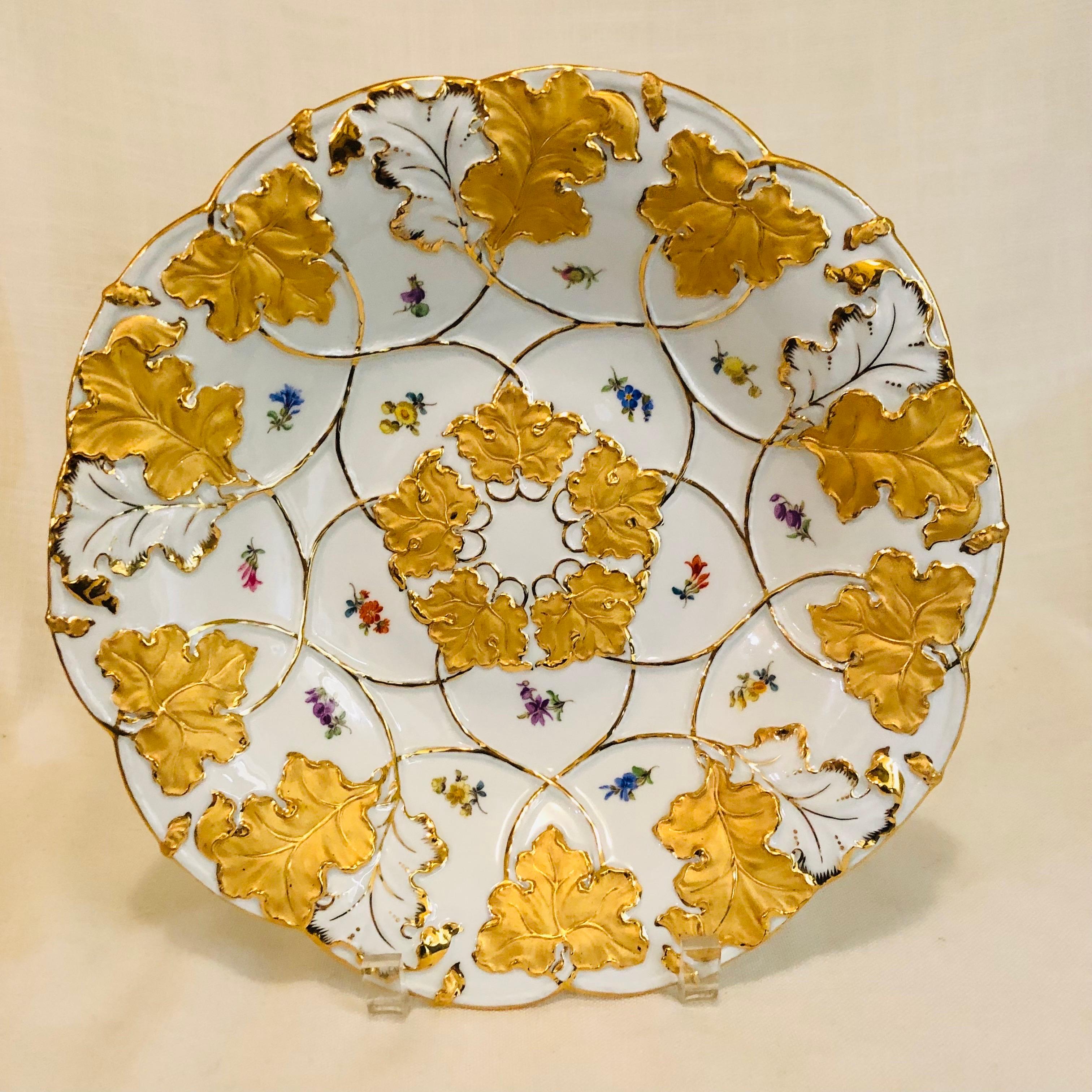 This is a fabulous Meissen Charger which is decorated with a border of gilded acanthus leaves. The center of this charger has a circle of more gilded acanthus leaves. The beautiful gilding on this Meissen charger is definitely very eye-catching. The