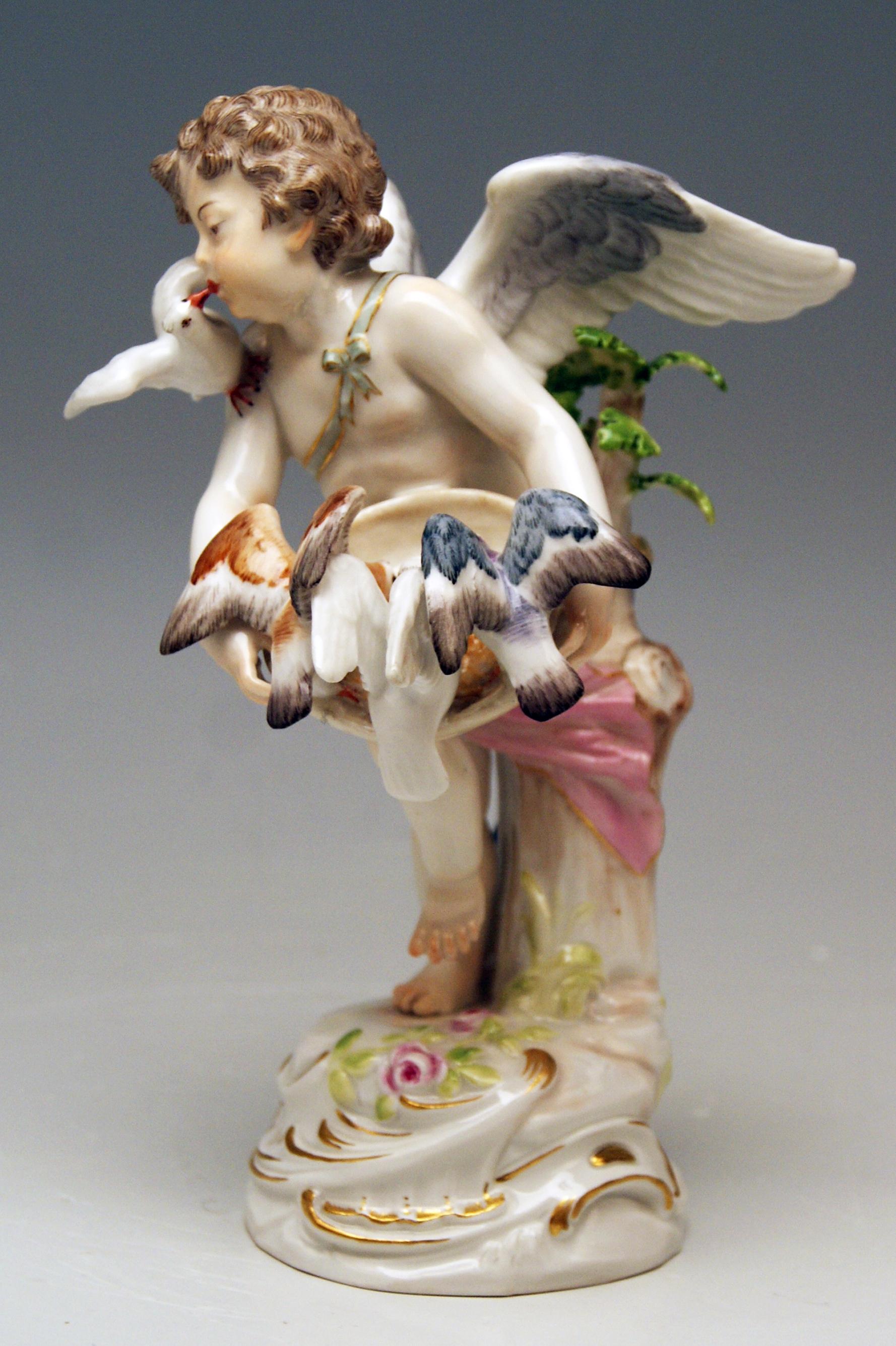 Meissen most lovely figurine: Cherub Feeding Pigeons

Manufactory: Meissen 
Dating: made circa 1900
Hallmarked: Meissen Mark with Pommels on Hilts (shortly after Turn of the Century)
First quality
model number R 122 / former's number 16 /