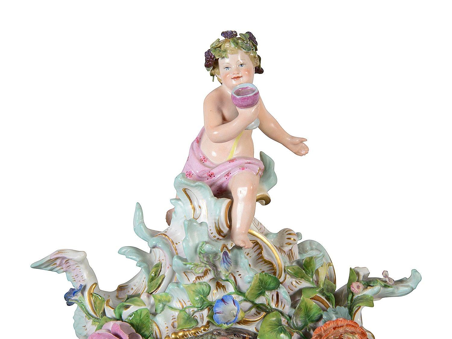 A very impressive, fine quality 19th Century Meissen porcelain clock garniture, having putti surround the clock and pair of candelabra representing the four seasons, the enamel clock face with roman numerals, an eight day duration movement, strikes