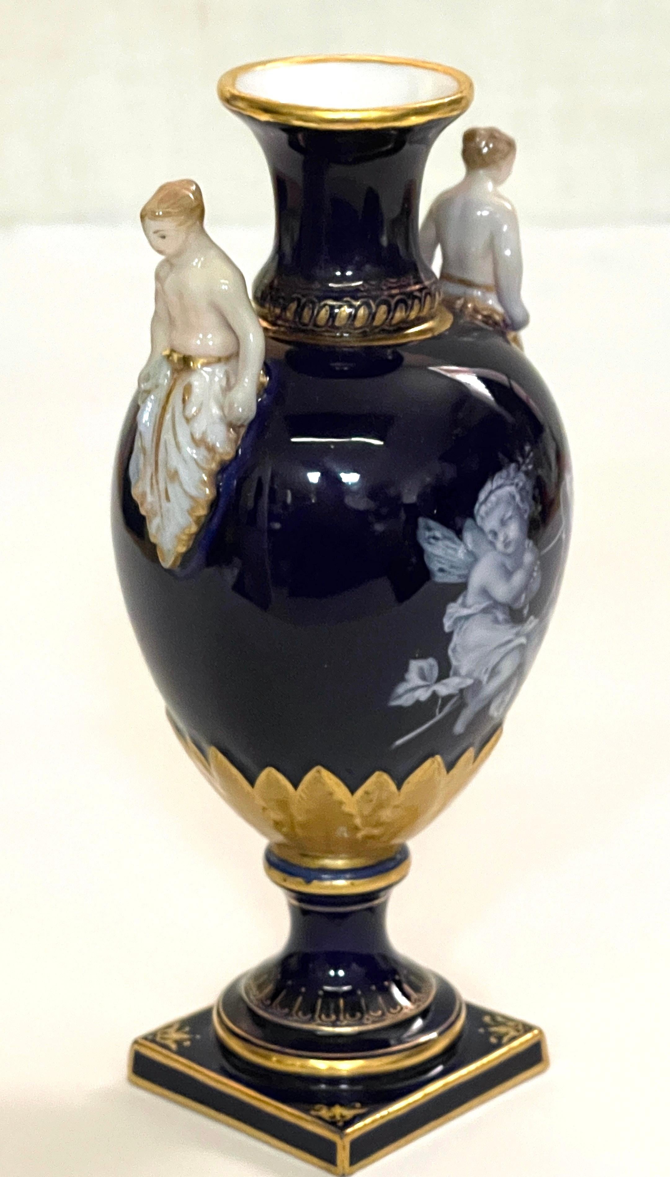 Porcelain Meissen Cobalt Ground Pâte-sur-pâte Figural Vase, Attributed to Leuteritz For Sale