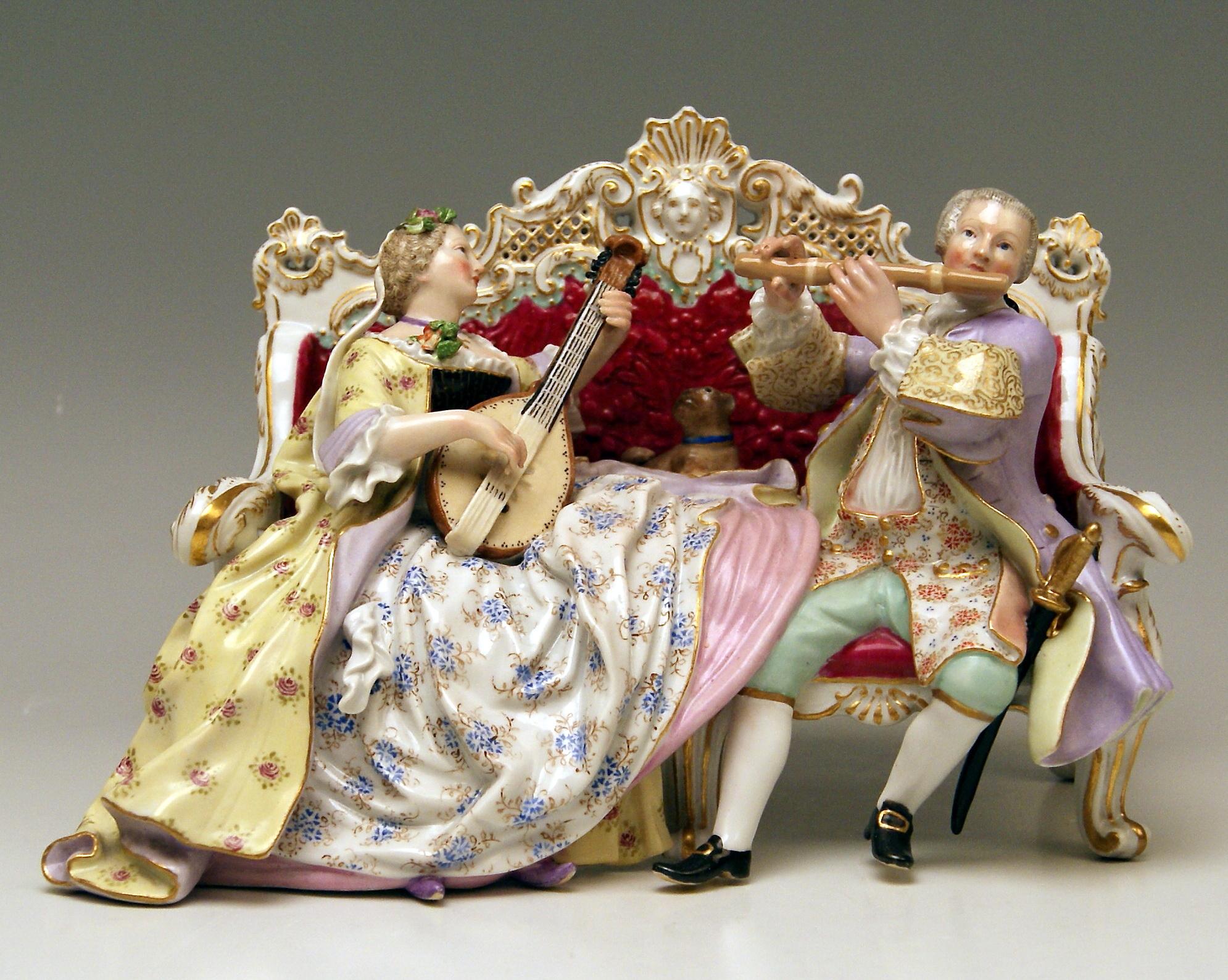 Meissen Gorgeous Group of Gigurines: Gallant couple on settee making music.
The Details Are Stunningly Sculptured = Finest Modelling

Manufactory: Meissen 
Dating: made circa 1870
Hallmarked: Meissen Mark with Pommels on Hilts (19th