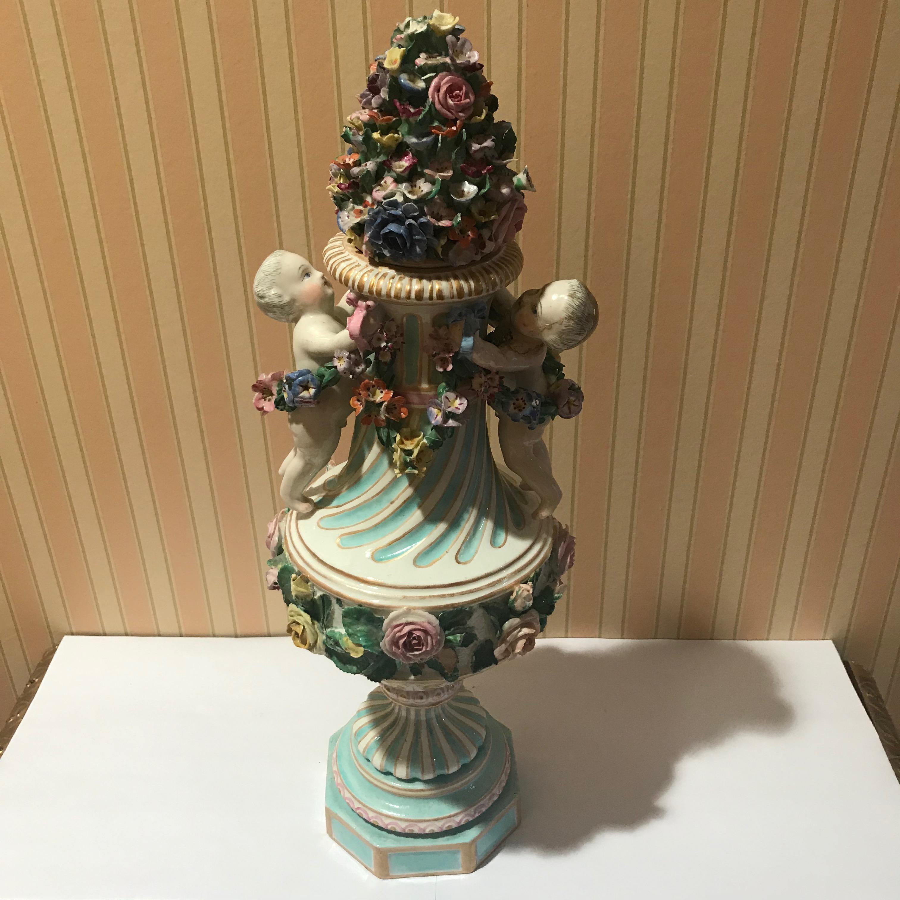 Meissen covered figural vase, 1774-1815,
With blue underglazed crossed swords and star mark to undersides. (2).
Measures: H 17 1/2 in.