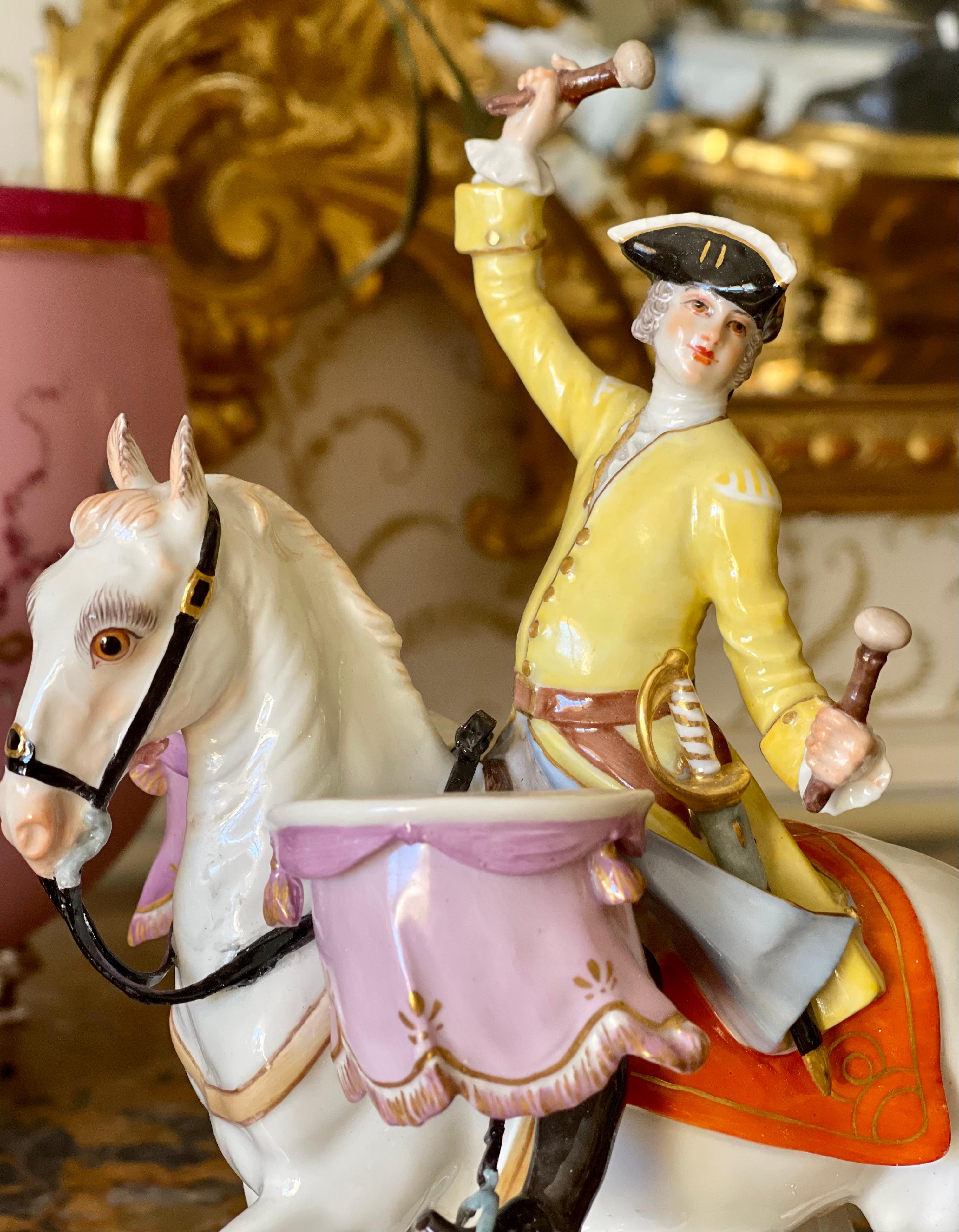 Polychrome porcelain subject depicting a horseman on the drum in perfect condition. Features the Meissen mark underneath and it is also dated 1963.