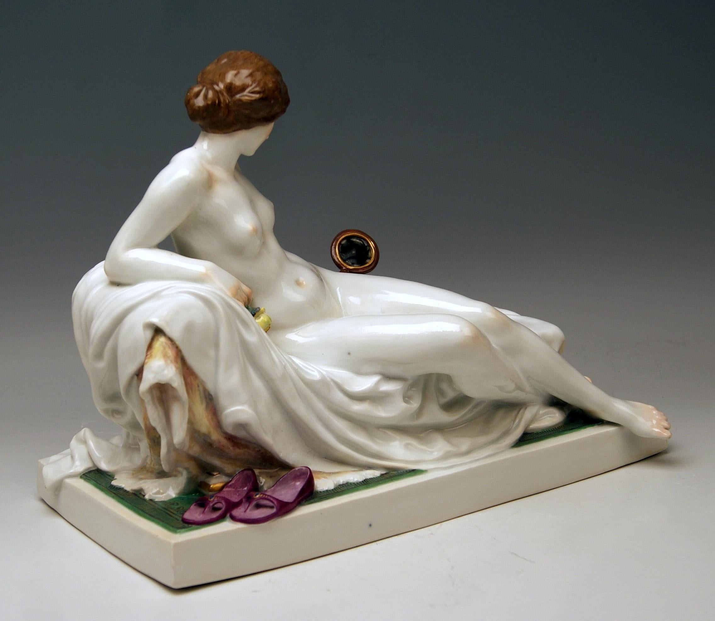 Meissen gorgeous figurine of nude lady with mirror / created by Robert Ockelmann 
 
Manufactory: Meissen
Hallmarked: Blue Meissen Sword Mark (underglazed)
First quality
Dating: made circa 1903-1905 
Material: porcelain, glossy finish,