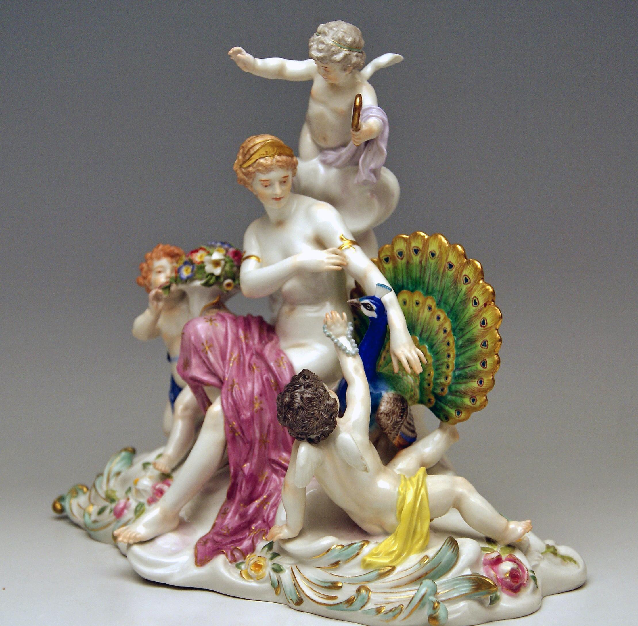 Meissen gorgeous group of figurines: 
Allegory of Air / Roman Goddess Juno with Peacock
The details are stunningly scupltured = finest modelling

Manufactory: Meissen 
Dating: made circa 1900
Hallmarked: Meissen Mark with Pommels on Hilts (around