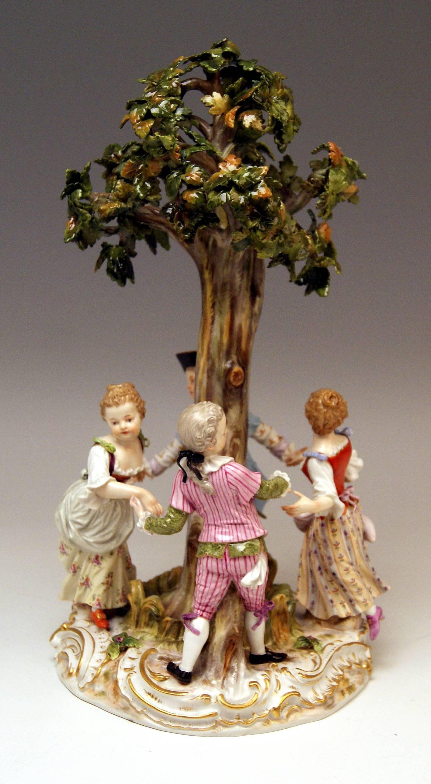 Meissen Gorgeous Figurine Group:
Dancing Boys And Girls / Gardener Children Under A Tree / The Details Are Stunningly Scupltured = Finest Modelling

Design:
-- Johann Joachim Kaendler (1706-1775)
The sculptor was since year 1731 modeller of