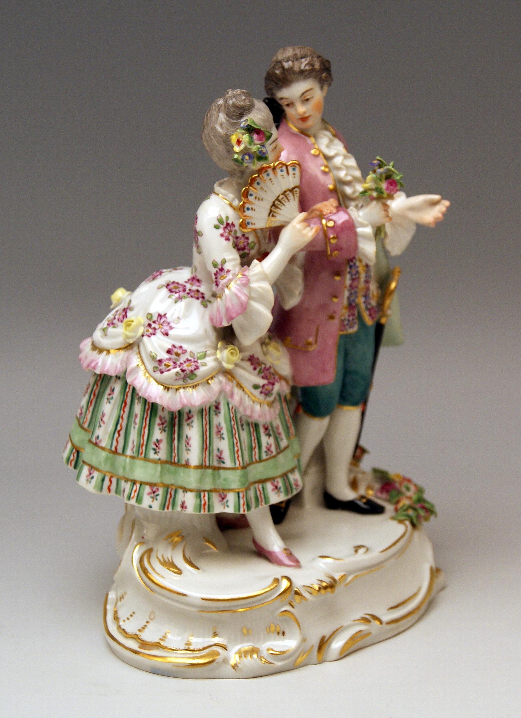 Meissen most lovely Gallant Couple Clad in Rococo Garments. 

Size:
Height: 19 cm (= 7.48 inches) 
Width of base: 12.5 cm (= 4.92 inches)
Depth of base: 9.5 cm (= 3.74 inches)

Manufactory: Meissen
Hallmarked: Blue Meissen Sword Mark