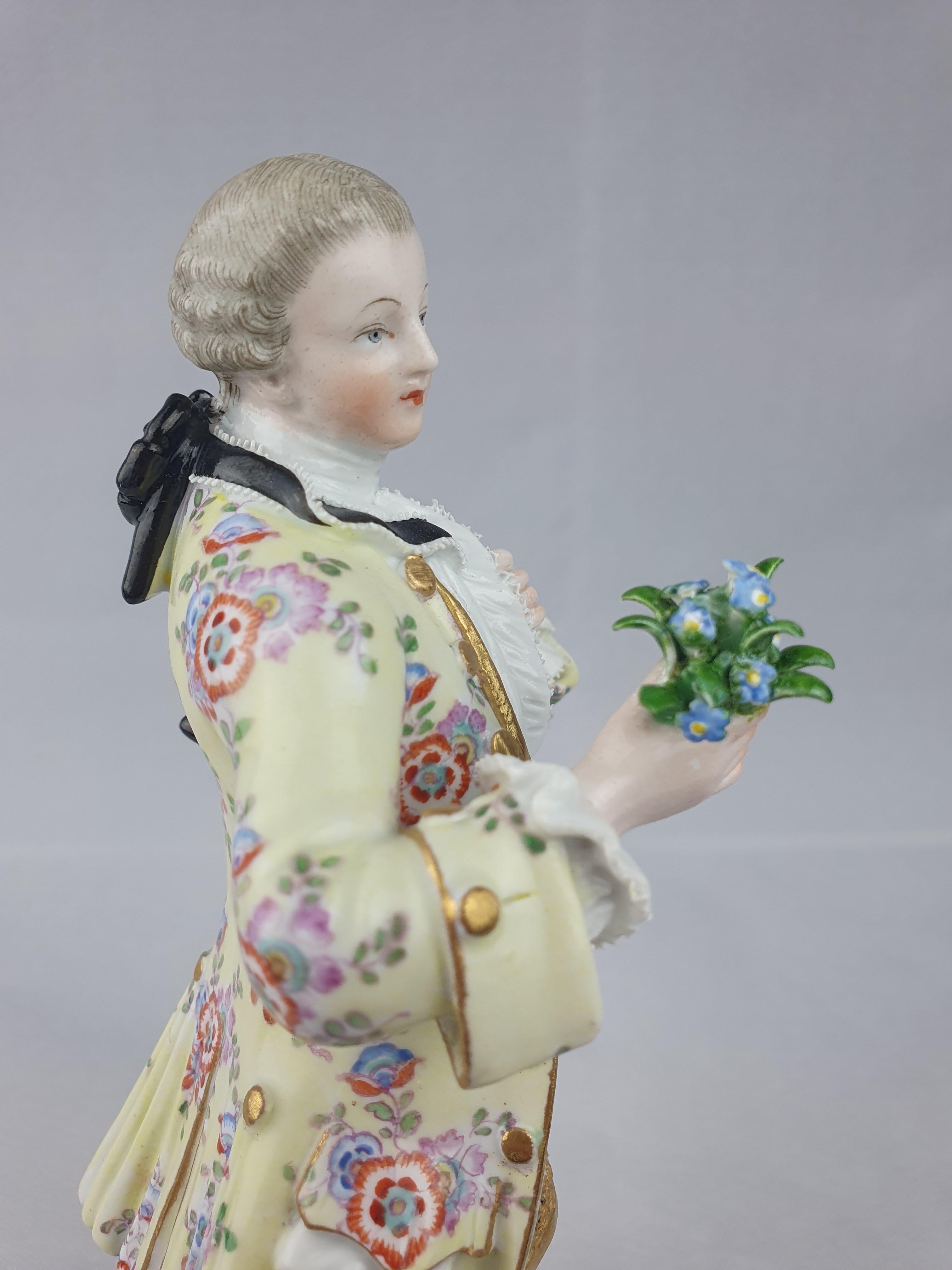 Hand-Painted Meissen Gallant Holding Flowers For Sale