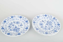 Meissen, Germany. 3 porcelain dinner plates with “Blue Onion” pattern.