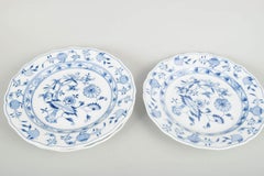 Meissen, Germany. 4 porcelain dinner plates. “Blue Onion” pattern. Early 20th C.
