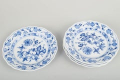 Meissen, Germany. 4 porcelain salad plates. “Blue Onion” pattern. Late 20th C.