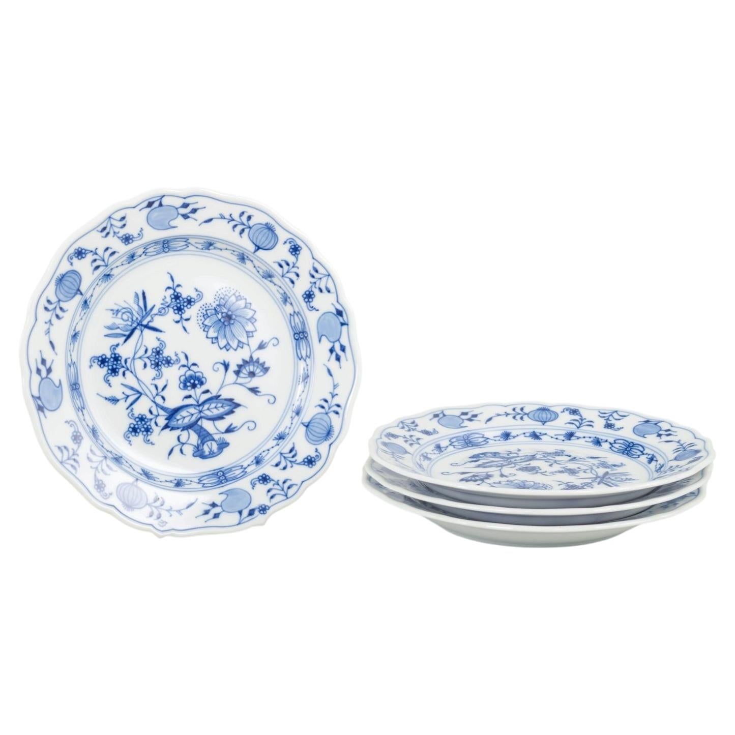 Meissen, Germany. 4 porcelain salad plates. “Blue Onion” pattern. Late 20th C.