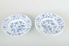 Meissen, Germany. 4 porcelain soup plates with “Blue Onion” pattern.
