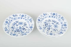 Meissen, Germany. 4 porcelain soup plates with “Blue Onion” pattern.