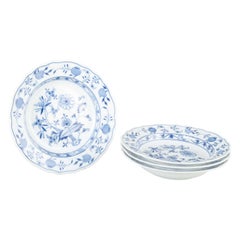 Meissen, Germany. 4 porcelain soup plates with “Blue Onion” pattern.