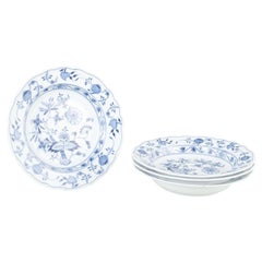 Meissen, Germany. 4 porcelain soup plates with “Blue Onion” pattern.