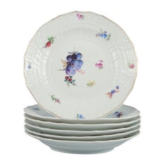Meissen, Germany. A set of six antique deep porcelain dinner plates.