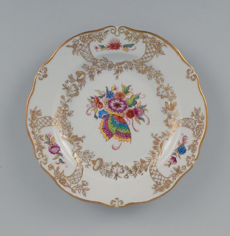 Meissen, Germany, antique hand painted plate decorated with flowers, butterfly and gold.
Late 19th century
Fifth factory quality.
In good condition, with minor defects from production.
Marked.
Dimensions: 25.5 x 3.0 cm.