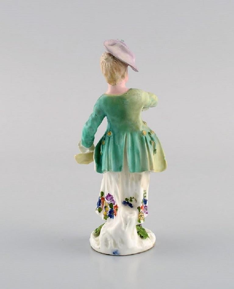 Rococo Revival Meissen, Germany. Antique hand-painted porcelain figure. Lady with flowers.  For Sale