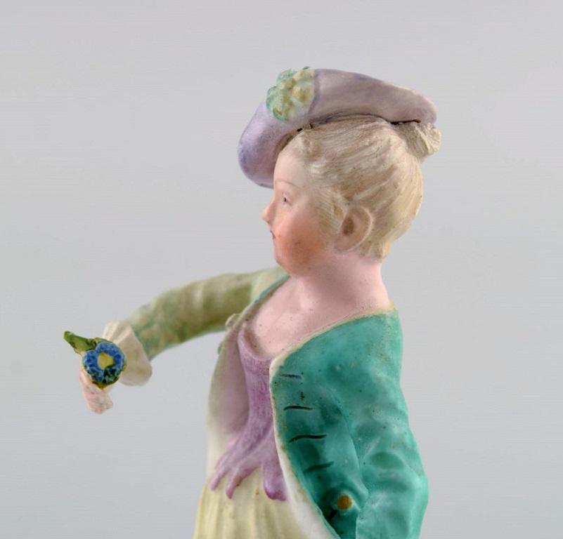 Porcelain Meissen, Germany. Antique hand-painted porcelain figure. Lady with flowers.  For Sale