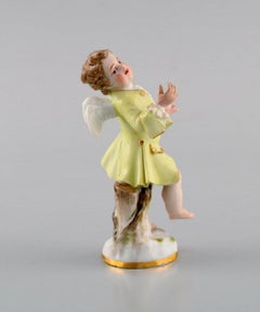 Meissen, Deutschland, antike handbemalte Porzellanfigur, Putto. Ca. 1900