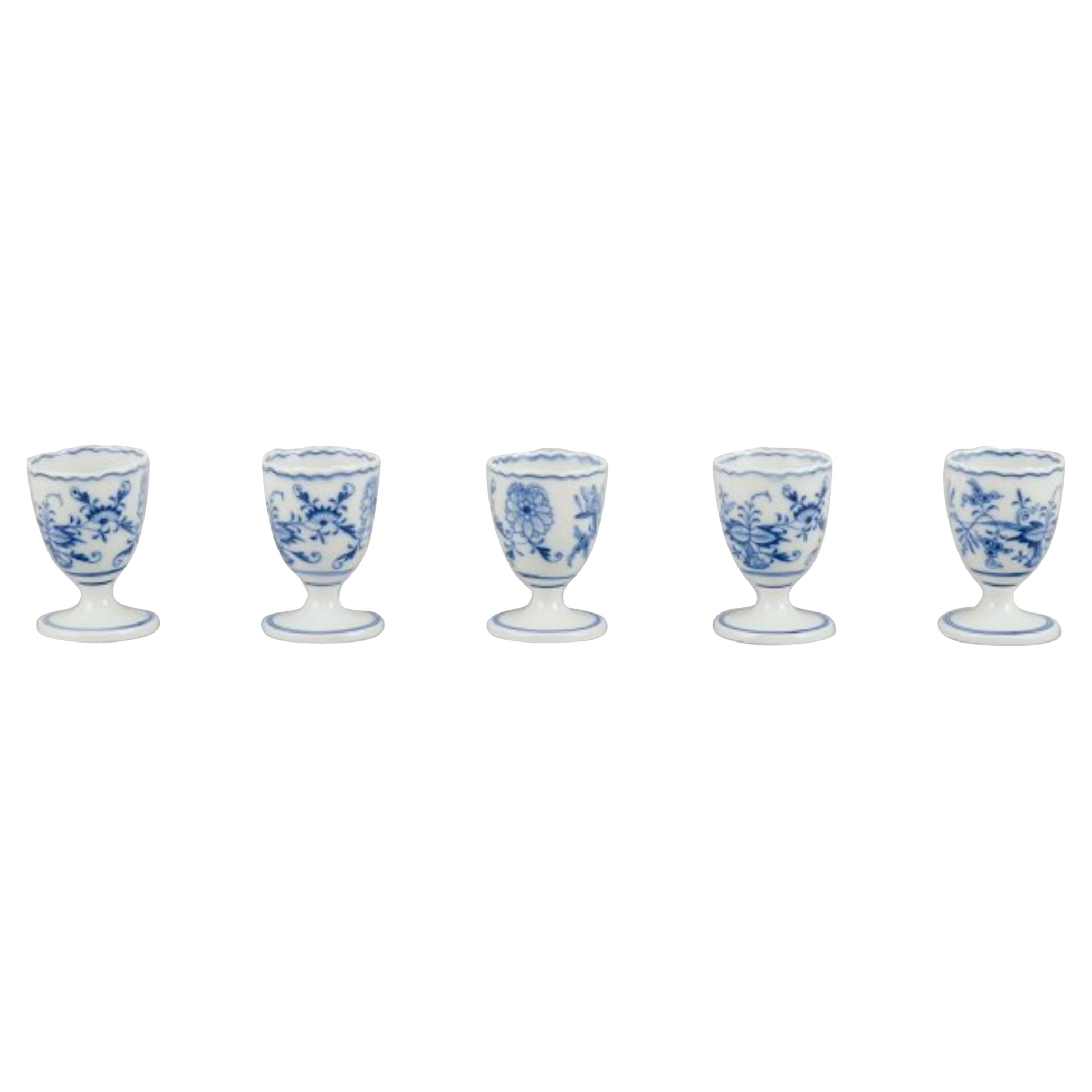 Meissen, Germany. Blue Onion pattern. Five egg cups. Hand-painted in blue.