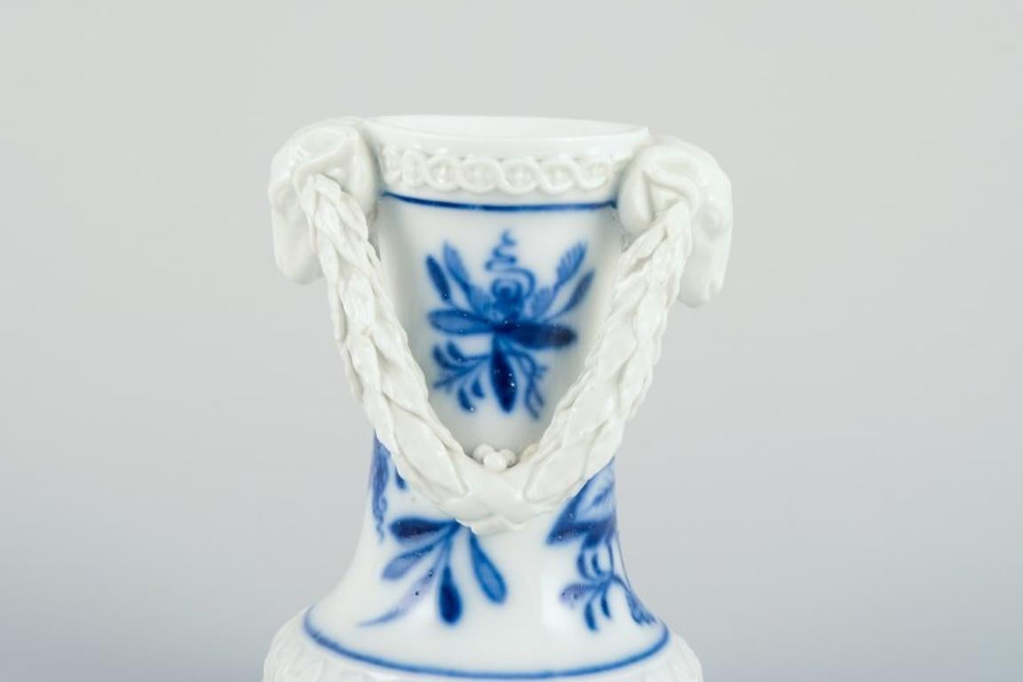 Porcelain Meissen, Germany. Blue Onion pattern. Rare miniature vase with ram's heads. For Sale