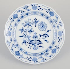 Meissen, Germany. Blue Onion pattern.  Set of seven plates in porcelain.