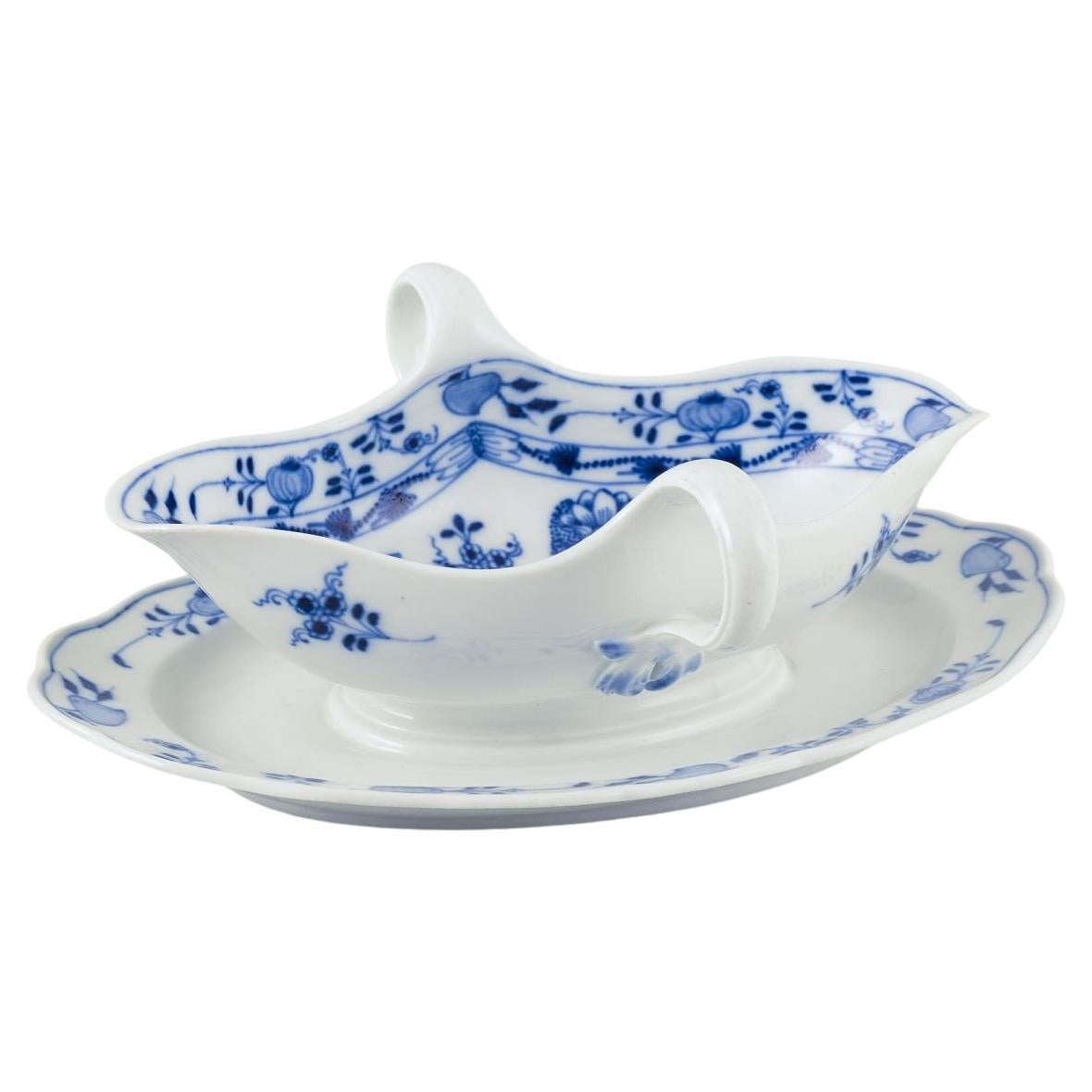 Meissen, Germany. Blue Onion porcelain gravy boat with two handles on a foot. For Sale
