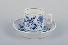 Meissen, Germany. Blue Onion. Set of three small chocolate cups with saucers.