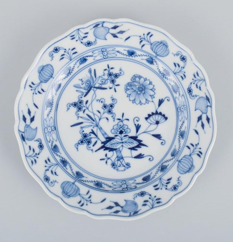 Meissen, Germany, four Blue Onion pattern plates.
Hand-painted.
Approx. 1900.
Marked.
In perfect condition.
Third factory quality.
Dimensions: D 17.4 cm.


