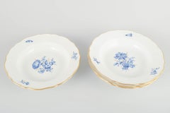 Meissen, Germany. Four deep porcelain plates with floral motifs. Early 20th C.