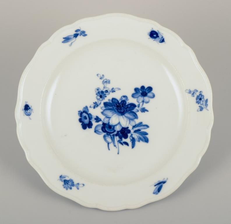Early 20th Century Meissen, Germany. Four porcelain lunch plates with floral motifs and insects. For Sale