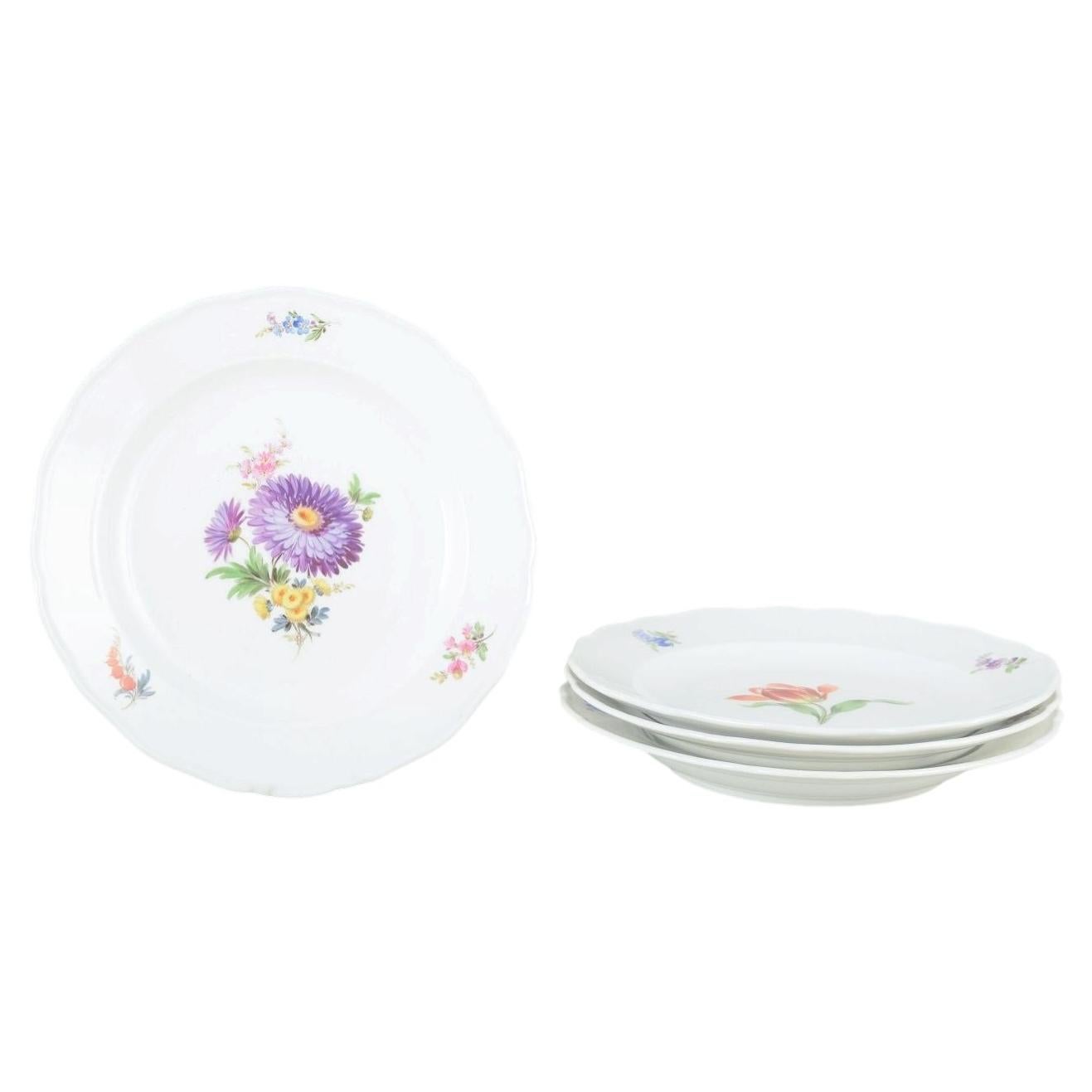 Meissen, Germany. Four porcelain plates with floral decoration. Ca 1930s