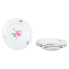 Meissen, Germany. Four porcelain plates with floral decoration. Ca 1930s
