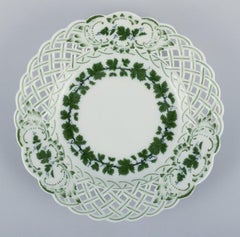 Meissen, Germany, Green Ivy Vine, eleven small plates with reticulated edges