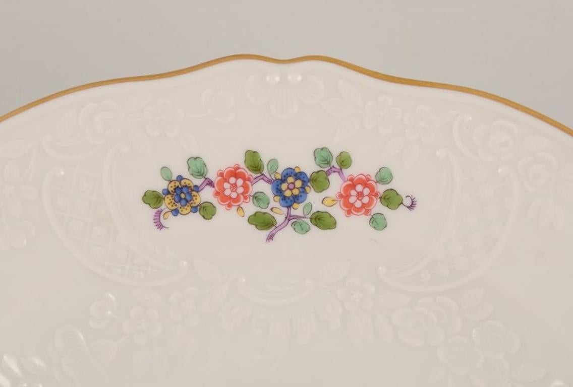 Hand-Painted Meissen, Germany. Hand-painted dinner plate with  butterfly and flowers For Sale