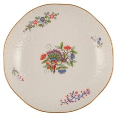 Meissen, Germany. Hand-painted dinner plate with  butterfly and flowers