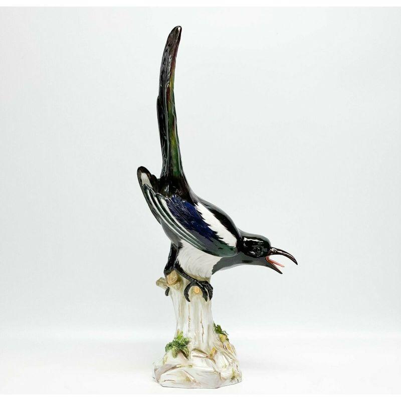 Meissen Germany Hand Painted Porcelain Figure of a Magpie, circa 1880 Porcelain figure depicts a magpie, tail up and mouth open, perched on a branch. Meissen crossed swords mark to the underside.

Additional information:
Country/Region of