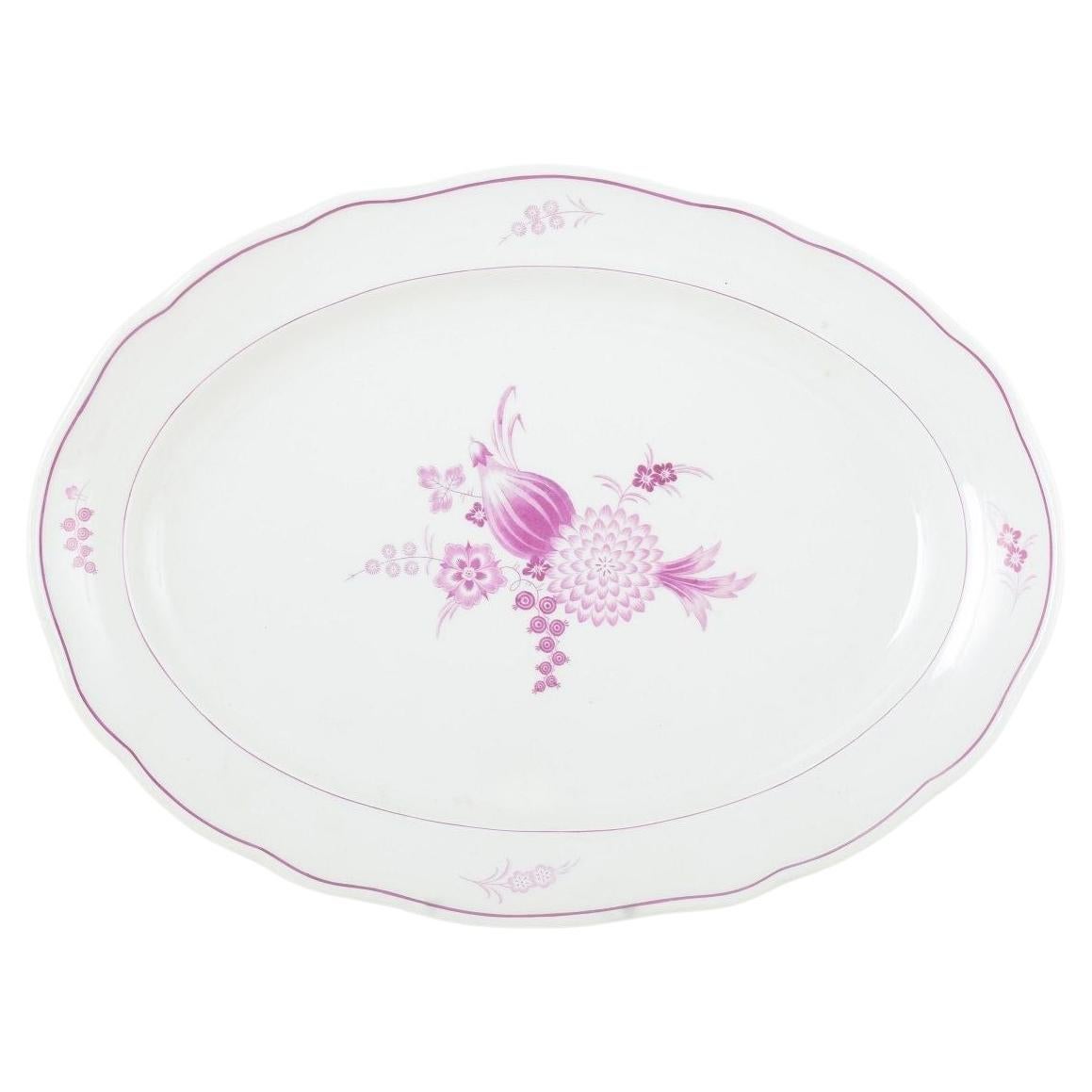 Meissen, Germany. Large oval porcelain serving dish with lilac floral motif.
