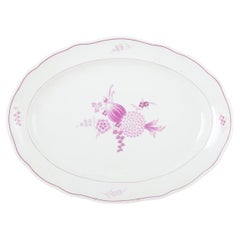 Meissen, Germany. Large oval porcelain serving dish with lilac floral motif.